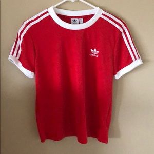 A red 3 stripped Adidas T-shirt